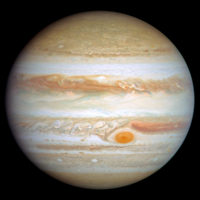 Jupiter, a massive planet with orange and white swirling bands and the Great Red Spot, a large storm.