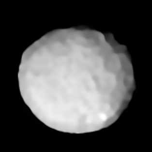 Pallas, a dark, slightly spherical shaped asteroid with visible craters.