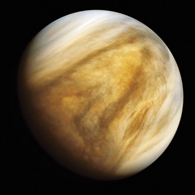 Venus, a bright yellow planet veiled by thick clouds and a dense atmosphere.