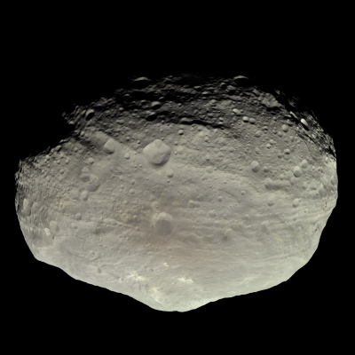 Vesta, an irregularly shaped asteroid with a gray, cratered surface.